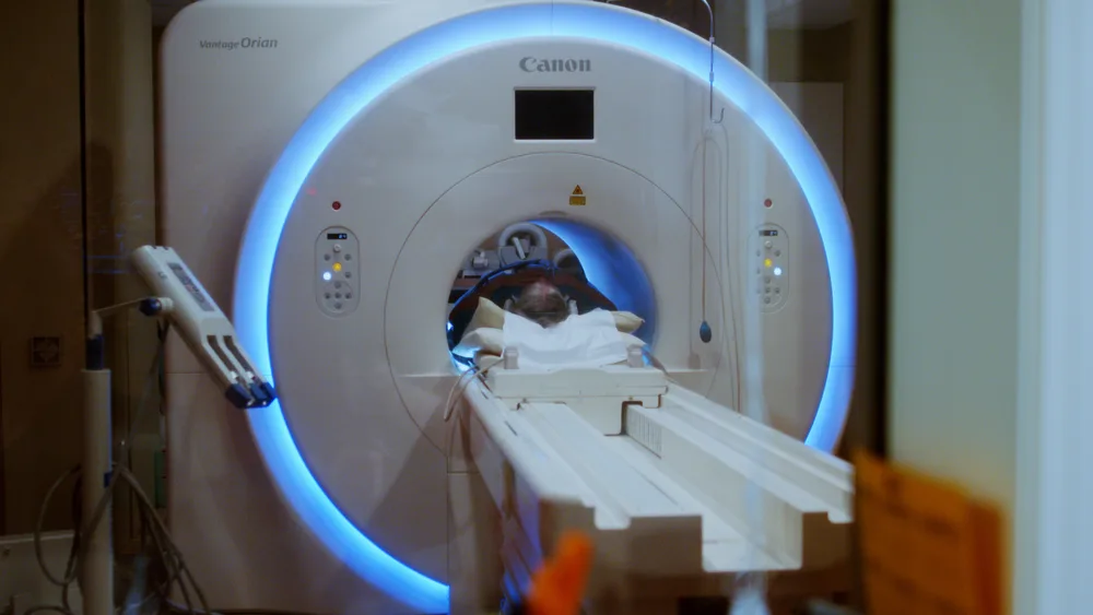 A patient being scanned in the Canon Vantage Orion 1.5T at NVRA